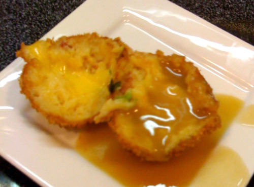 Great Balls Of Fire Deep fried mashed potato balls infused with bacon, garlic, and Sriracha with cheddar cheese centers and covered with gravy. (Submitted by Jason Tran)